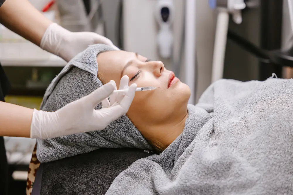 a woman receiving a botox injection