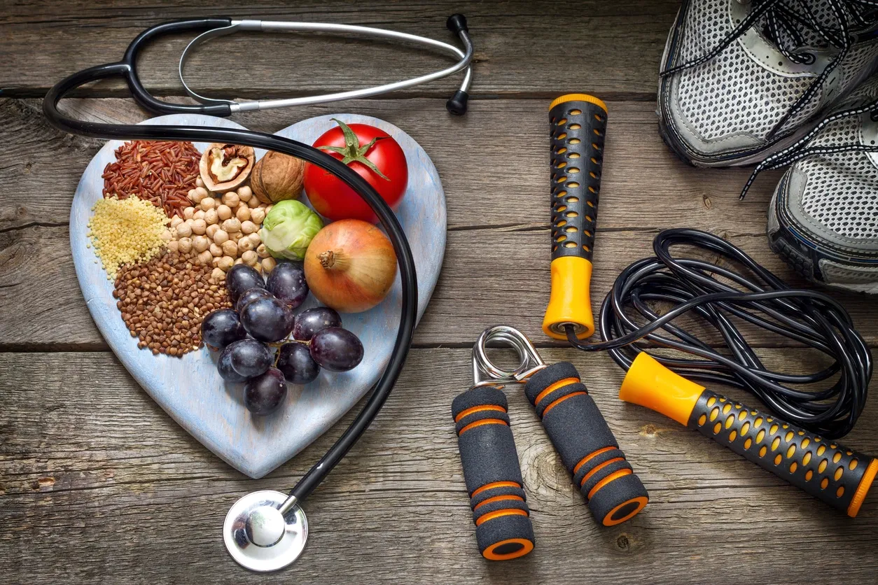 a heart shaped plate with food and jump rope