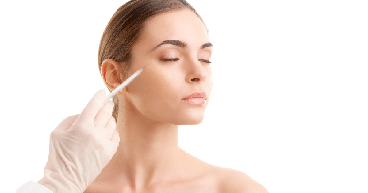Woman receiving Botox in Olympia, WA with injection near eye area from a Professional