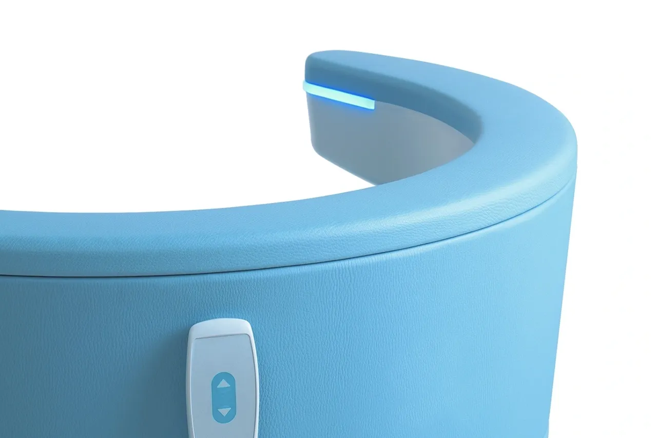 a close up of a blue chair - emsella