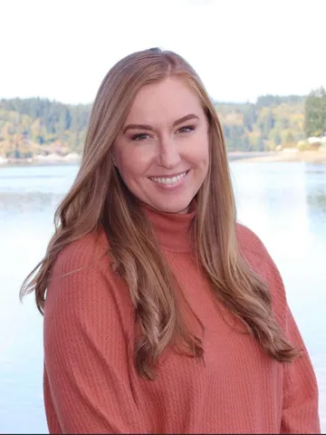 a woman smiling at camera - kelly
