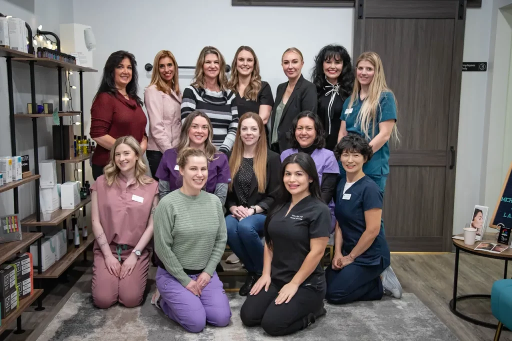 a group of women posing for a photo - rejuvenateolympia in washingtone us