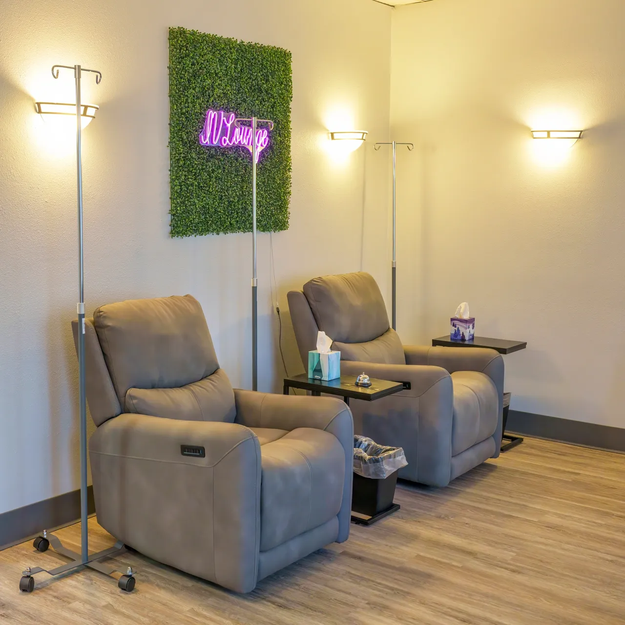 a room with chairs and a wall with lights - rs=w_1280,h_1280