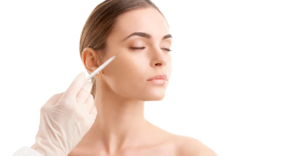 Woman receiving Botox in Olympia, WA with injection near eye area from a Professional